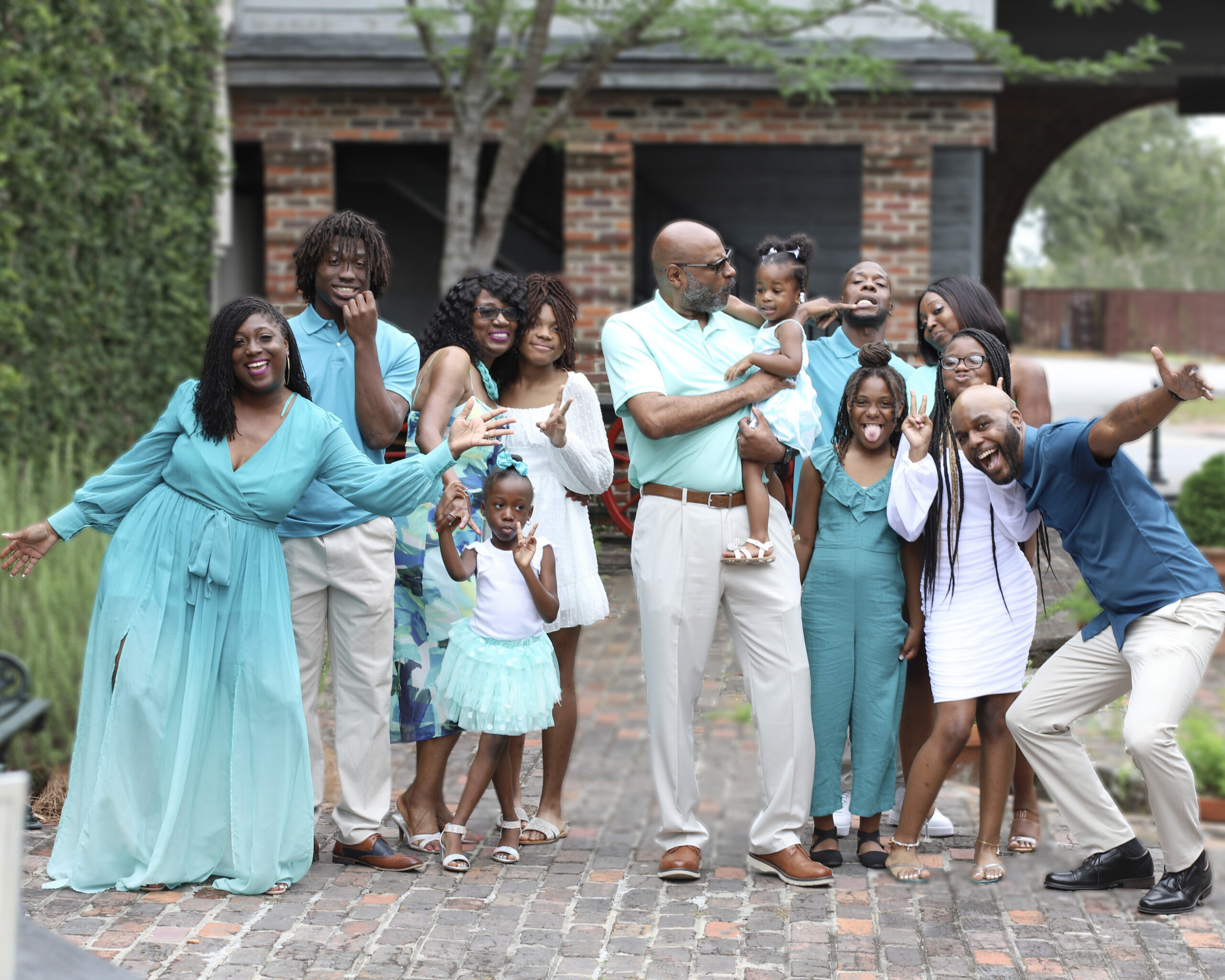 Family of eleven posing with fun and laughter