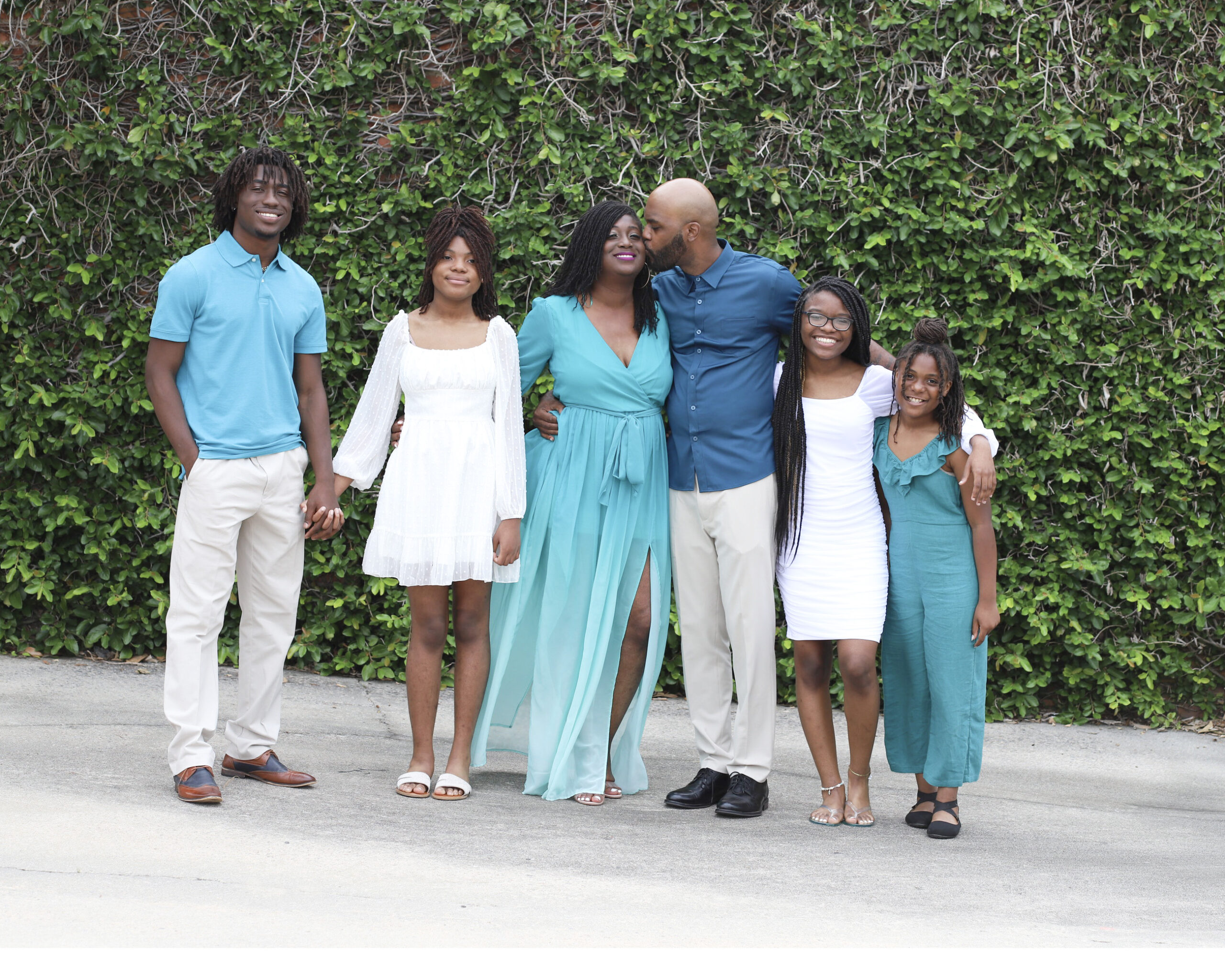 Family Portrait of five, holding hands